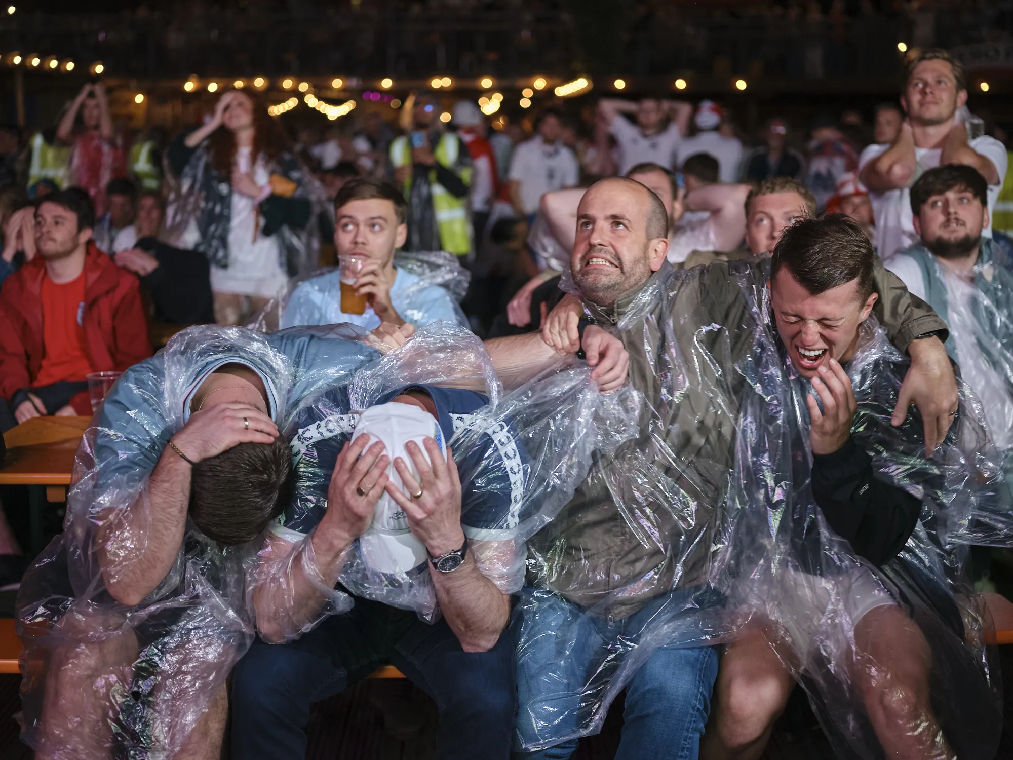 England fans in the rain, in despair