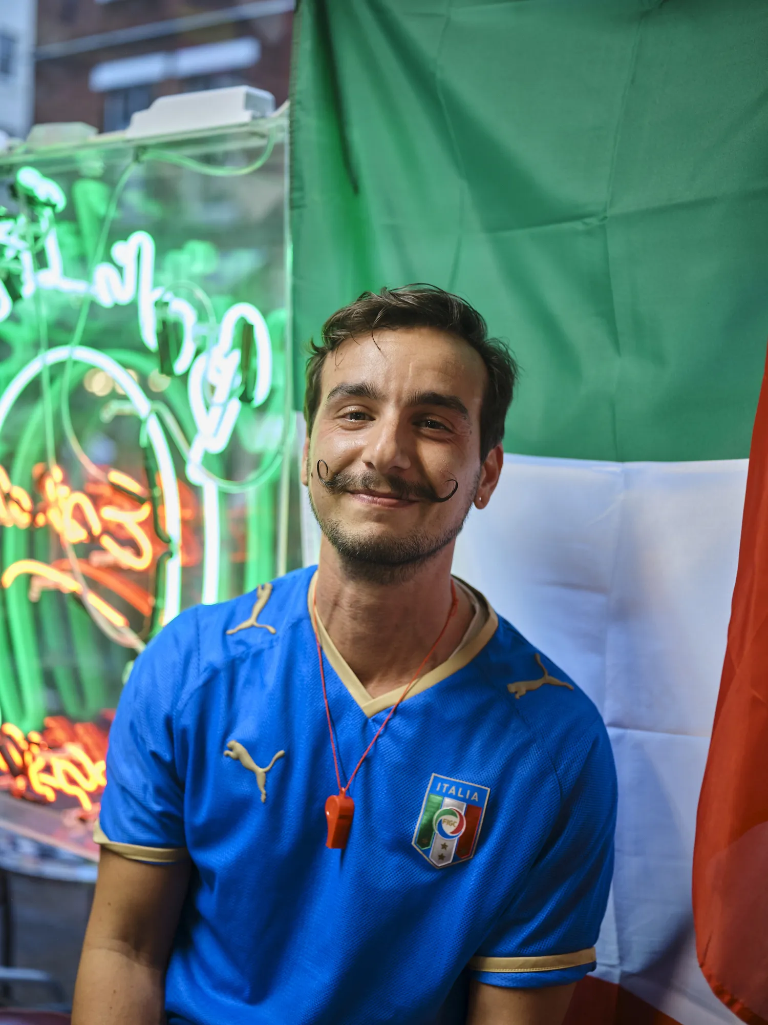 Italian fan with a handsome moustache