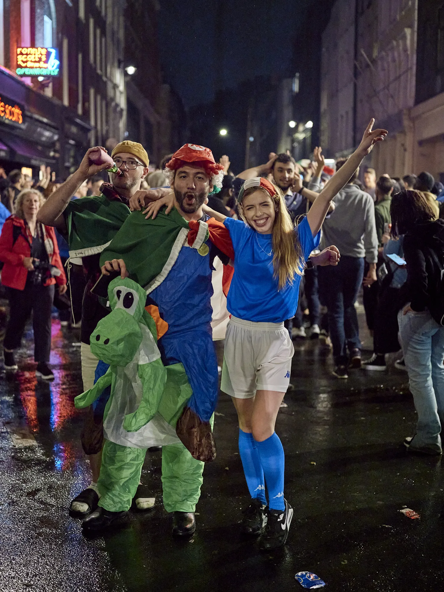 Italian fans celebrate at Bar Italia