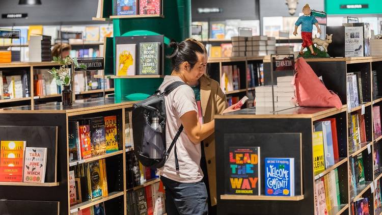 A man browsing in a bookshop