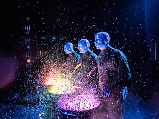 Blue Man Group playing drums Blue Man Group playing drums