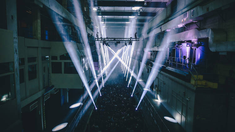 Printworks main room with lots of lights and a full crowd 