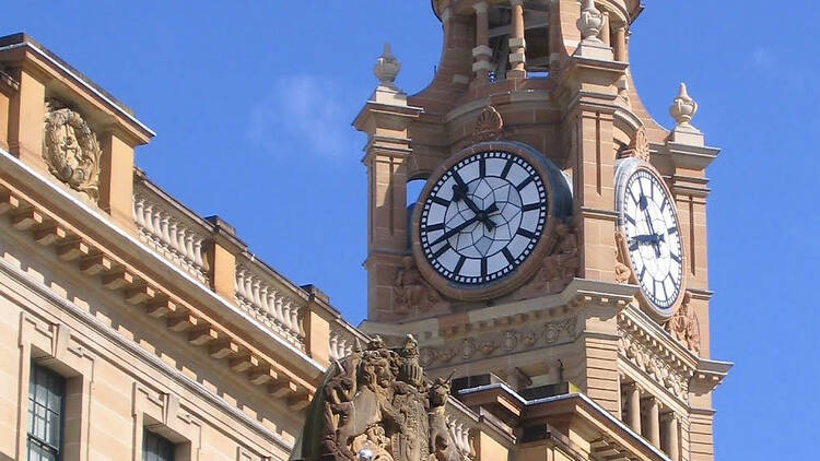 Sandstone building in gothic style, the Central Station clocktower and blue skies