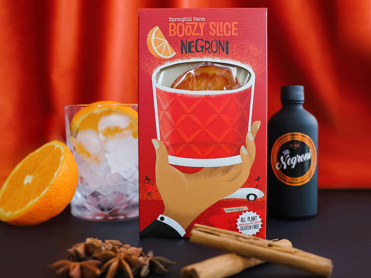 A box of Negroni slices and a bottle of ready-to-drink Negroni.