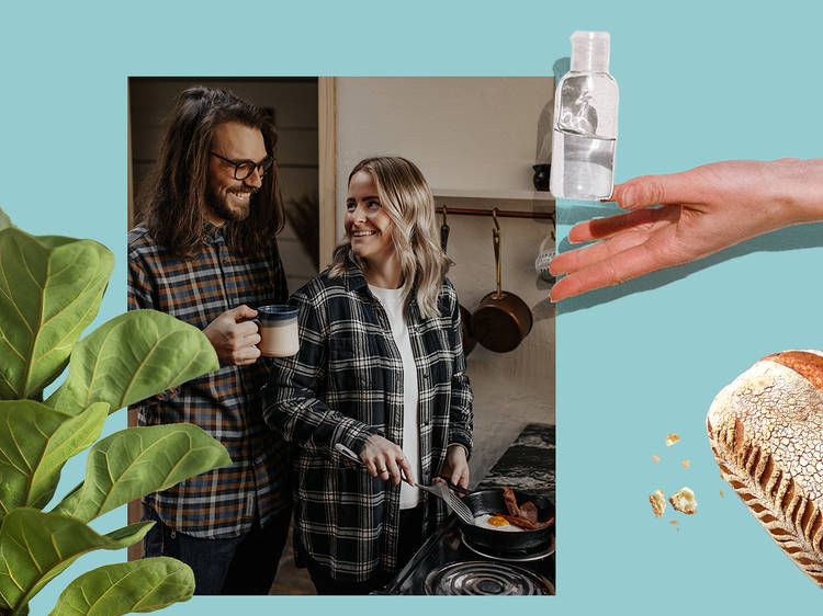 A photo of a couple cooking together is surrounded by a plant, a loaf of bread and hand sanitiser