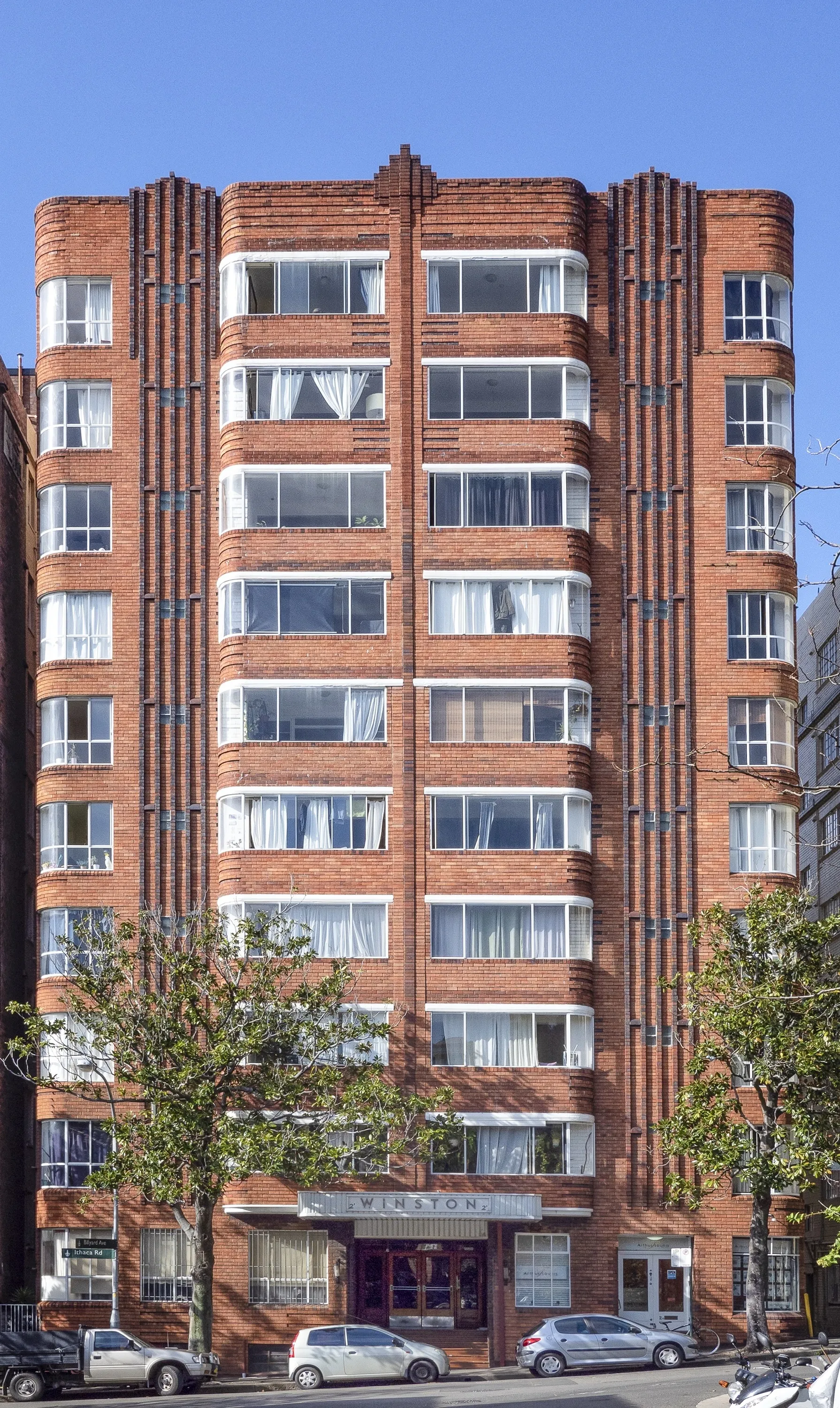 A view of the curved facade of Art Deco building the Winston in Potts Point
