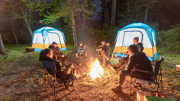 People sitting around a campfire