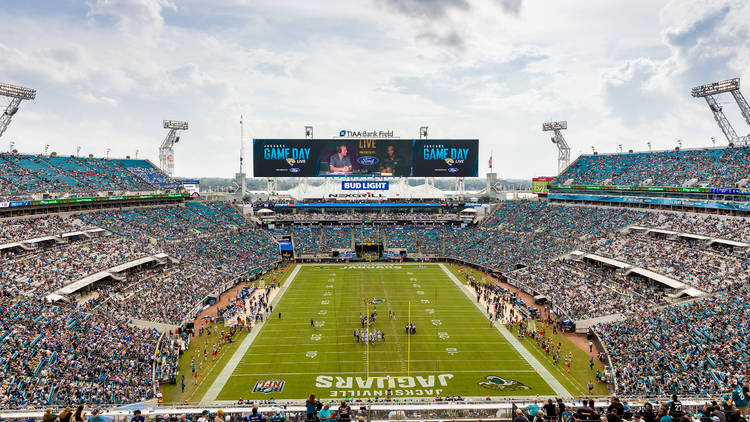 Fans in a full stadium for a football game