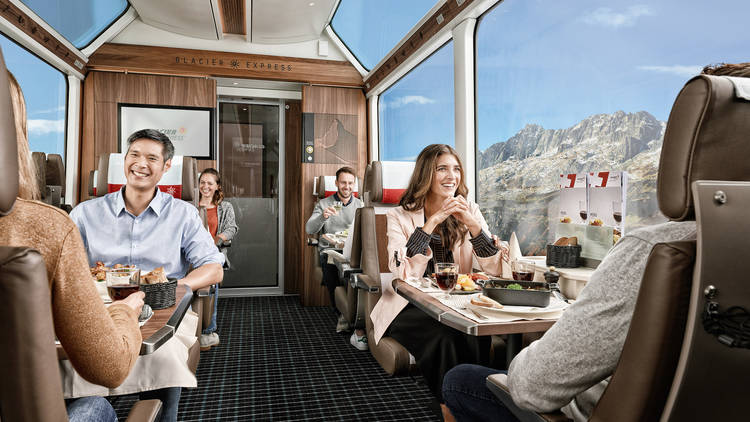 the inside of a carriage on the Glacier Express train.