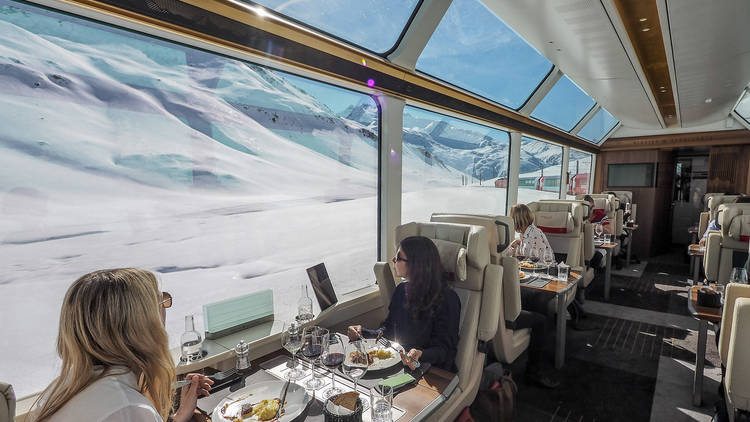 A carriage of the Glacier Express train with panoramic view windows.