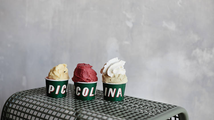 Piccolina Gelateria three cups with ice cream on seat