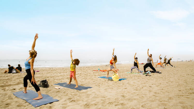 Take a yoga class on the beach