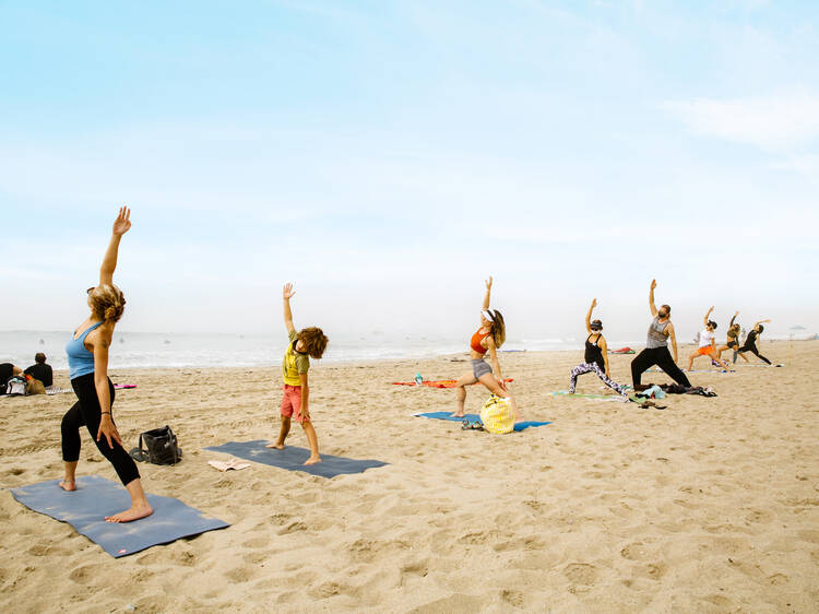 Take a yoga class on the beach
