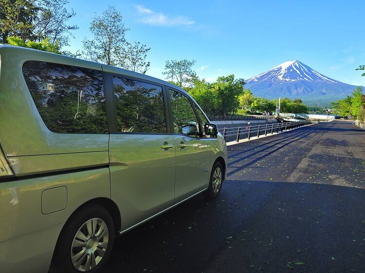 Car driving by Mt Fuji