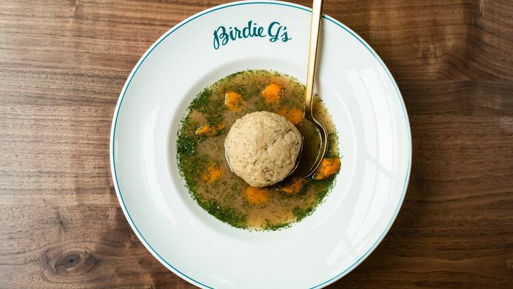 The matzo ball bowl soup made with carrot miso at Birdie G's in Santa Monica