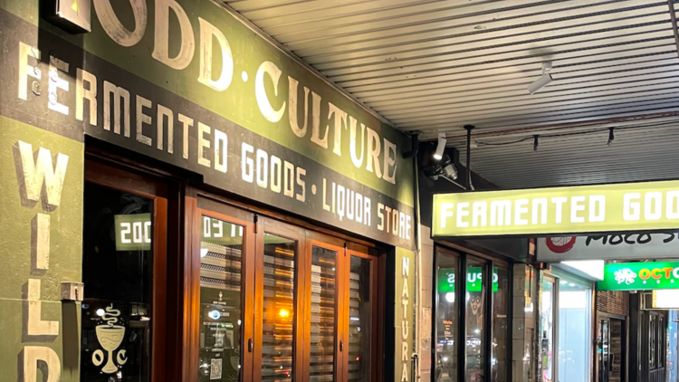 A shop front with the words Odd Culture, fermented foods and liquor store