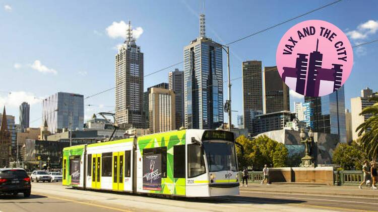 Melbourne tram passing Melbourne skyline