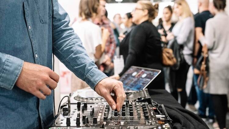 A DJ at an art event