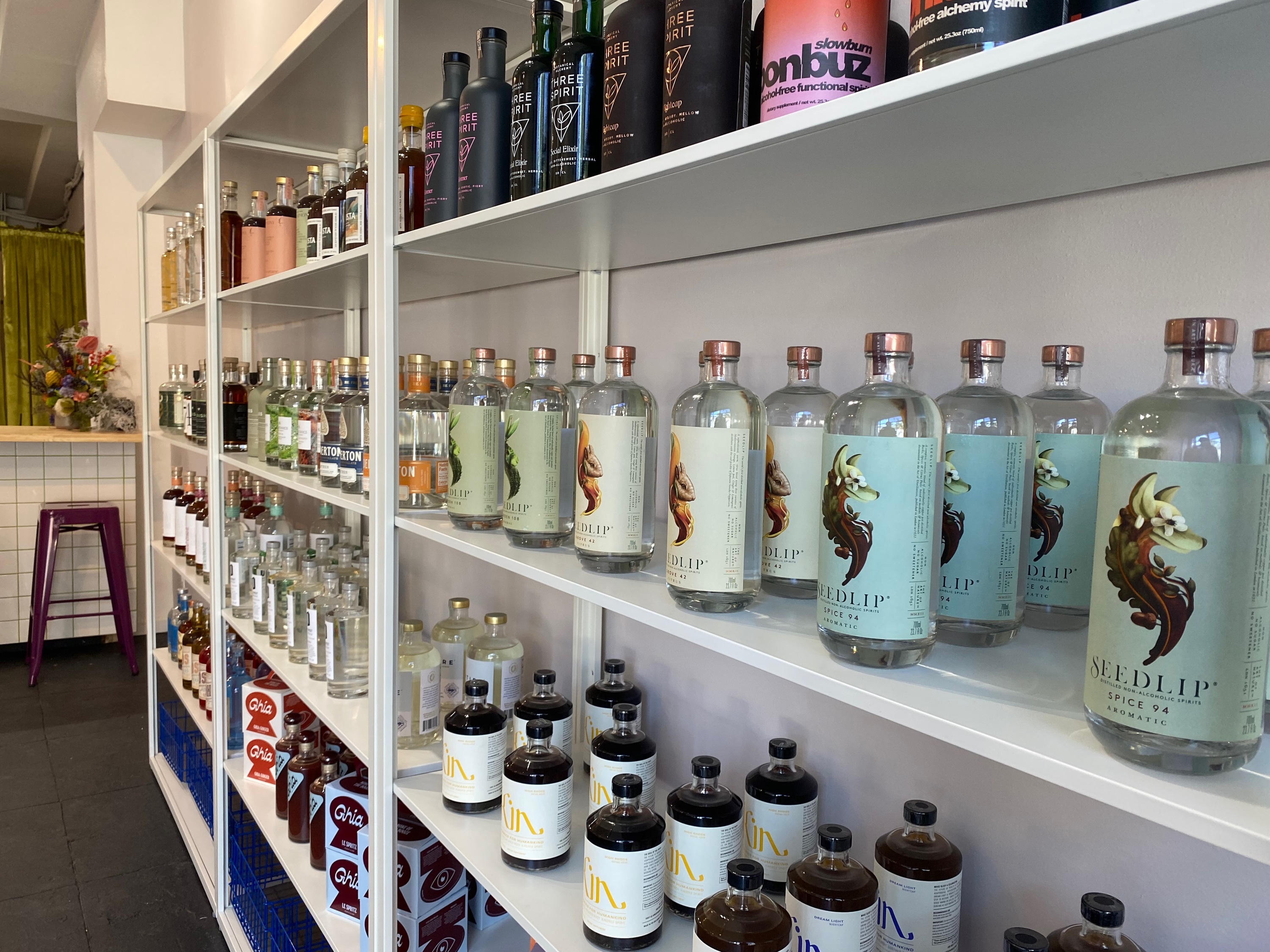 Seedlip, Kin, Three Spirits, and Konbutz on the shelf at Soft Spirits