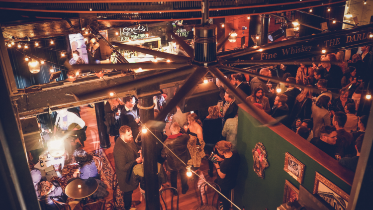 The foyer at the Eternity Playhouse is bustling with people