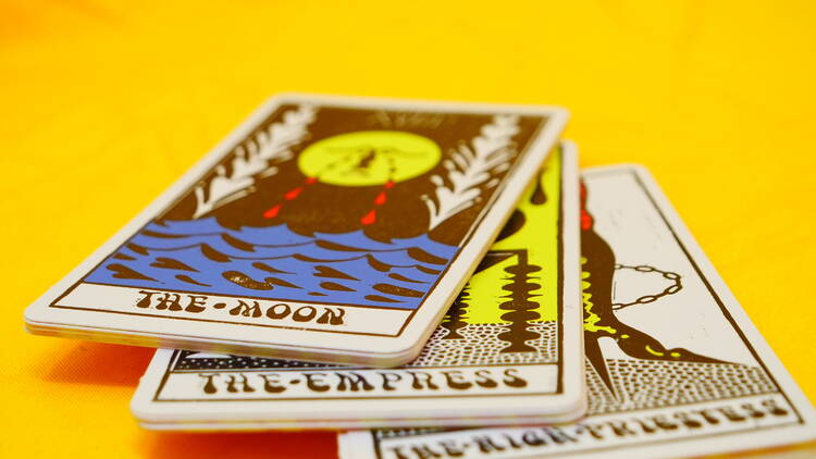 Tarot cards on a yellow background