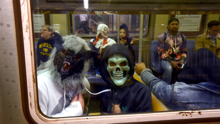 Hallowen costumes on the subway