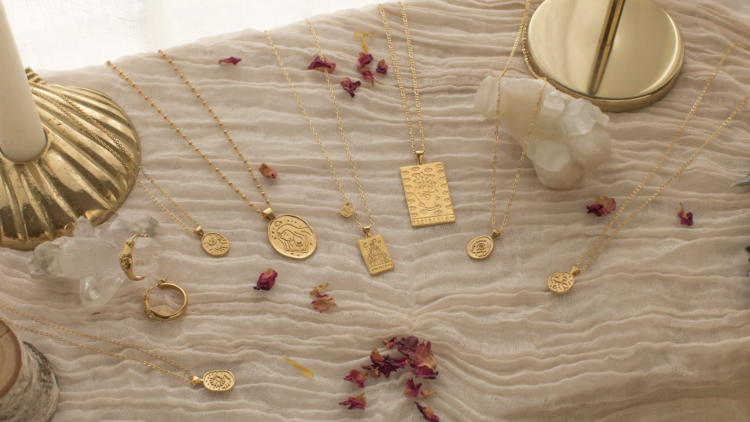 A set of gold necklaces by S-kin Studio Jewelry.
