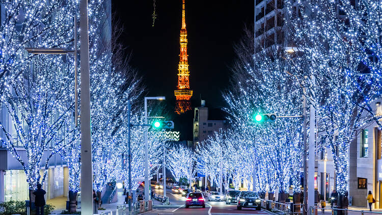 Tokyo, Ginza at golden hour. View along street, Louis Vuitton and