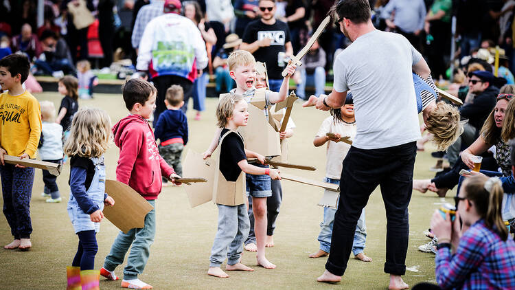 A group of young children playing together.