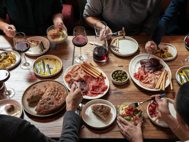 La Famiglia at La Madonna A family-style meal of cured meats and antipasti at La Madonna