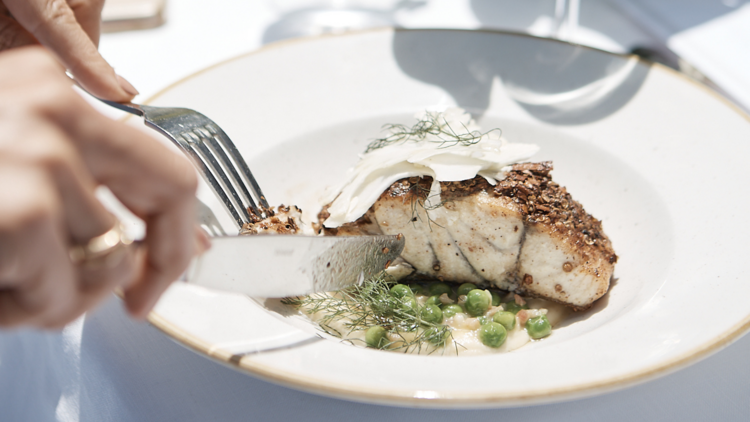 Spice crusted barramundi with peas and shaved fennel