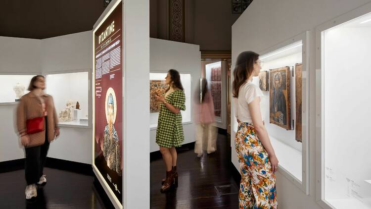 Woman wandering through an art exhibition. 
