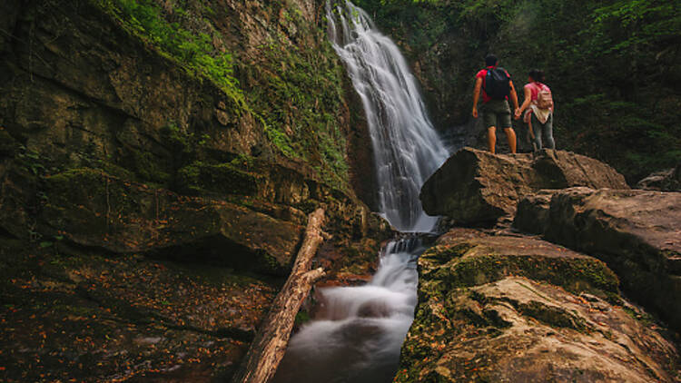 Hiking to a waterfall Hiking to a waterfall