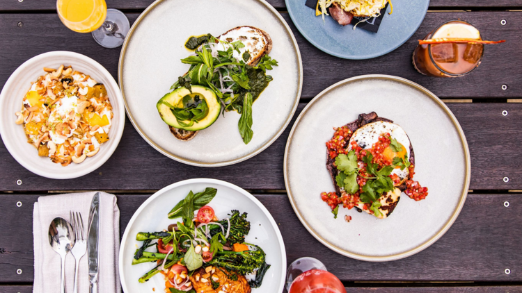 A flat lay of brunch with cocktails