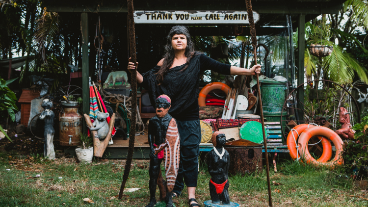 Artist Karla Dickens with found objects at her studio at Lismore