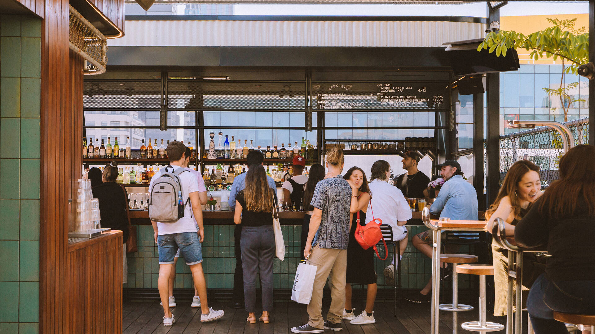 Visit Rooftop Bar on the uppermost level of Curtin House