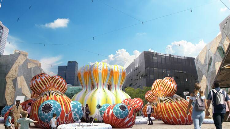 A render of Cupid's Koi Garden, featuring large, colourful inflatable sculptures of fish shooting water from their mouths