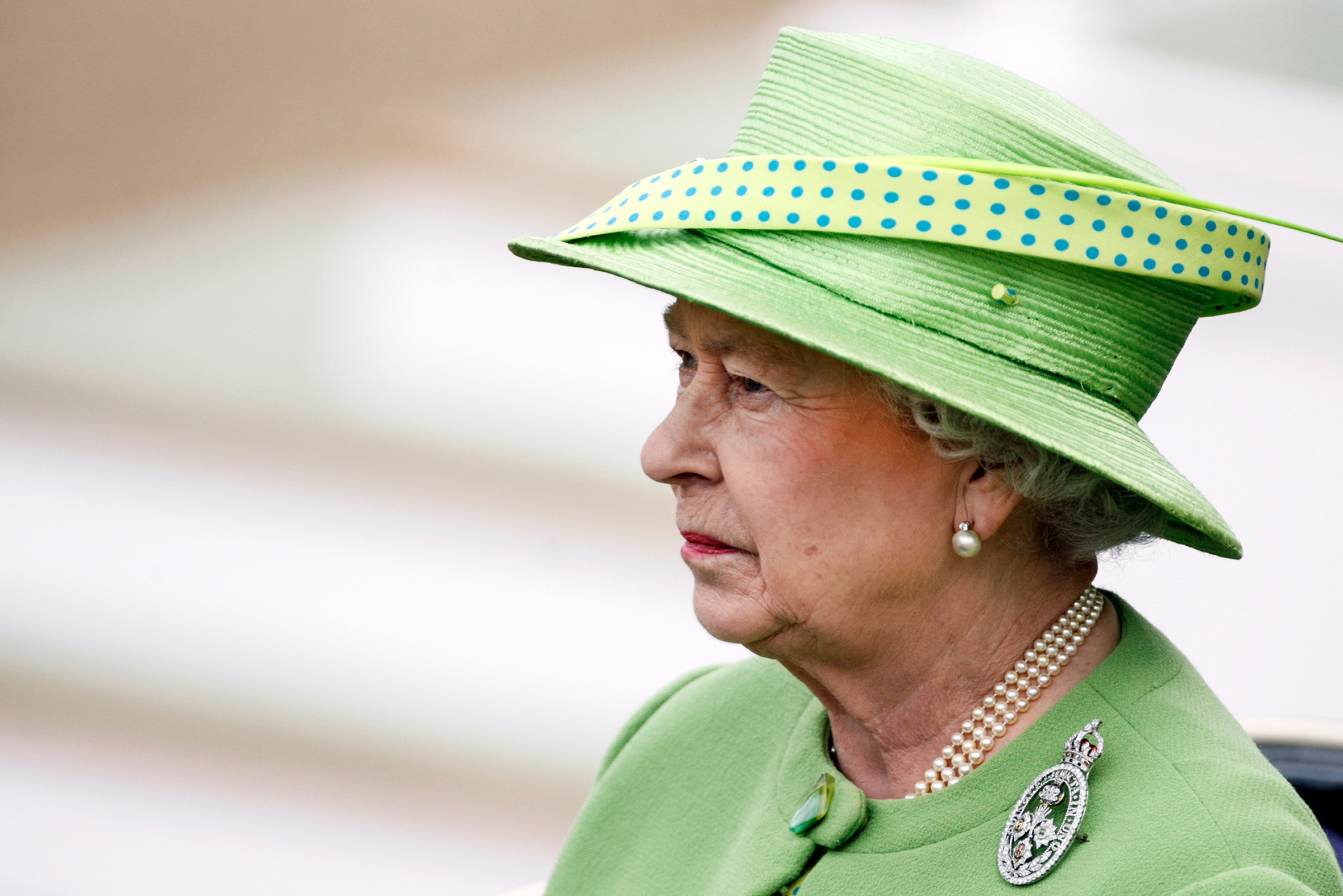 Royal funeral guests wear quiet tributes to the Queen