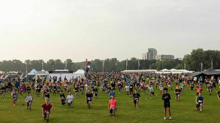 Participants in an exercise class on Hackney Marshes as part of Hackney Moves fitness festival