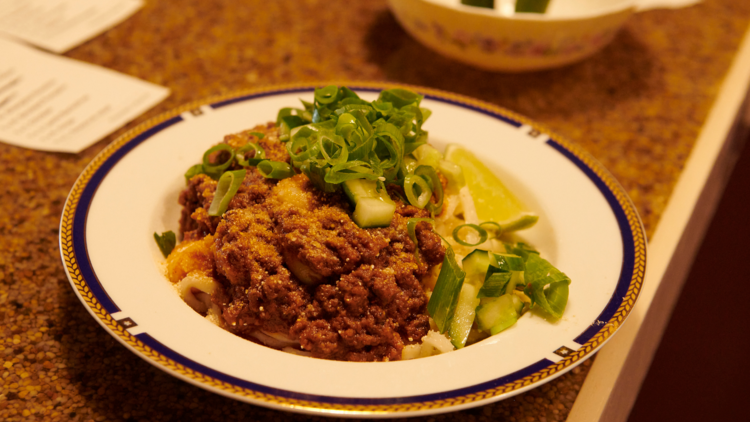 A plate of mince with greens