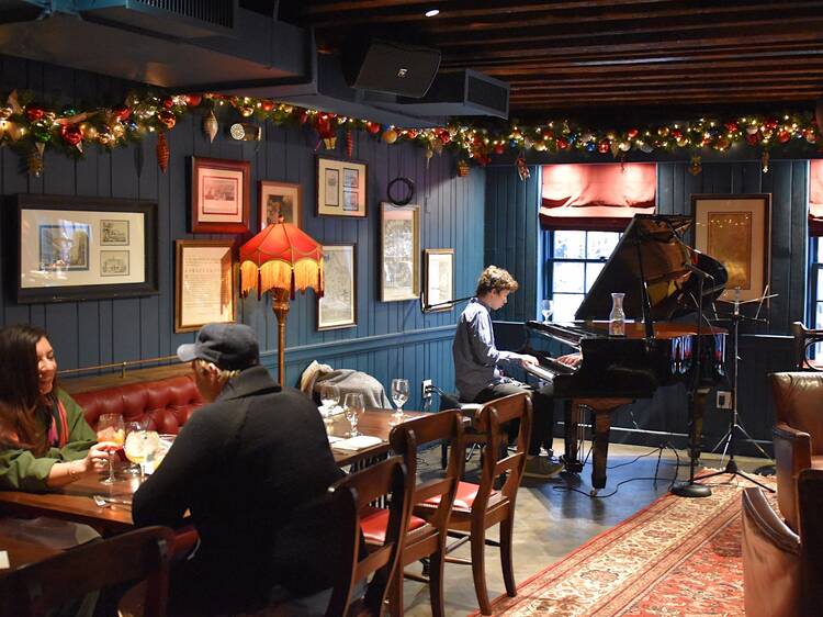 The Piano Bar Upstairs at Fraunces Tavern has live music, food and drinks in a classic NYC space