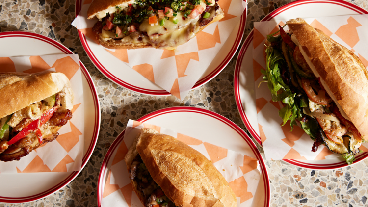 A flatlay of four sandwiches