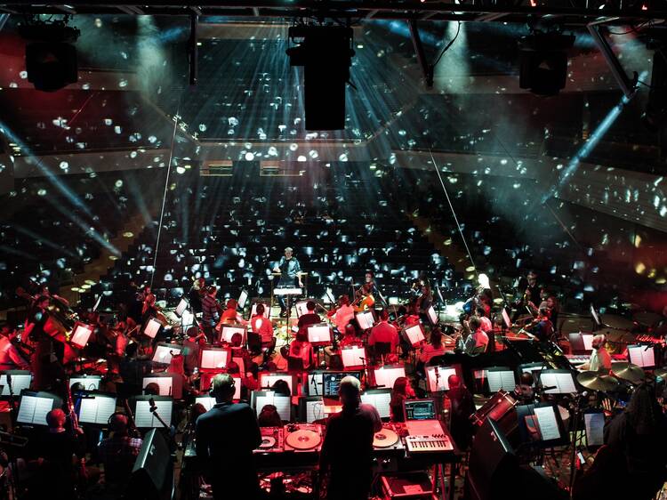 An orchestra under a glitter ball