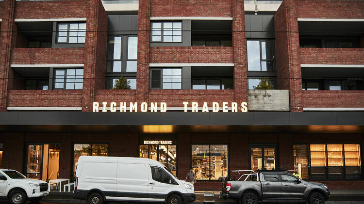 The brick exterior of new market Richmond Traders. 
