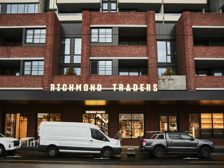 The brick exterior of new market Richmond Traders. 