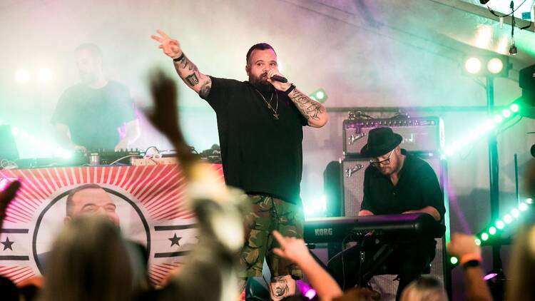 Briggs performing at Ngana Birrung