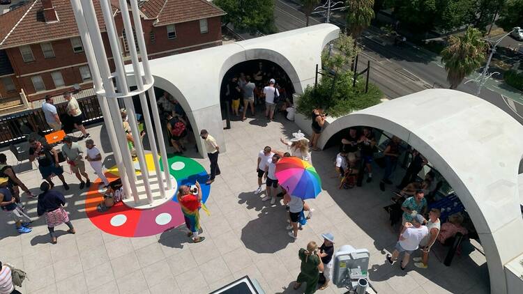 An aerial overview of an event happening at the Victorian Pride Centre.