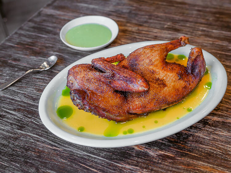The duck confit with tangerine and cilantro oil and a side of aji amarillo.