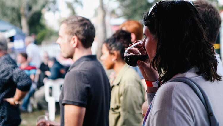 A crowd of people sipping wines at the Pyrenees Unearthed Festival. 