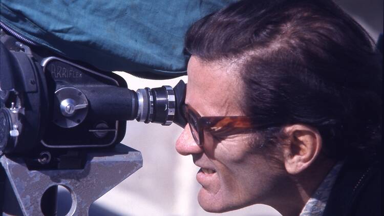 Film director Pier Paolo Pasolini looking in the camera